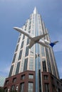 Airplane and Sky Scraper Royalty Free Stock Photo