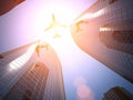 Airplane and skyscraper Royalty Free Stock Photo