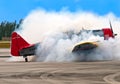 Airplane smokes Royalty Free Stock Photo