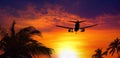 Airplane at sunset Royalty Free Stock Photo