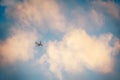 Airplane in a sunset sky Royalty Free Stock Photo