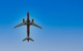 Airplane in the sunset sky flight travel transport airline background concept Royalty Free Stock Photo