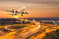 Airplane take off over the panorama city at twilight scene