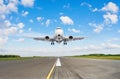 Airplane take off in runway against the background of clouds and blue sky Royalty Free Stock Photo