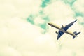 Airplane take-off from runways at cloudy sky.Color sepia