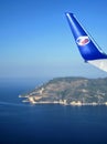 Airplane tale of a Travel Service charter airline flying over the the Ionian Sea, Greece.