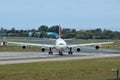 Airplane taxiing on runway of the airport Royalty Free Stock Photo