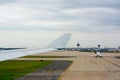 Airplane Taxiing on the Runway at the Airport Before Taking off Royalty Free Stock Photo