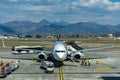 Airplane at the terminal gate ready for takeoff Royalty Free Stock Photo