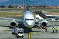 Airplane at the terminal gate ready for takeoff Royalty Free Stock Photo