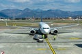 Airplane at the terminal gate ready for takeoff Royalty Free Stock Photo