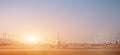 Airplane at the terminal gate ready for takeoff - Modern international airport during sunrise - Concept travel around the world Royalty Free Stock Photo