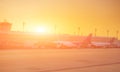 Airplane at the terminal gate ready for takeoff - Modern international airport during sunrise - Concept travel around the world Royalty Free Stock Photo