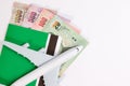 Airplane on Thai money, the rising costs of airline travel. Royalty Free Stock Photo