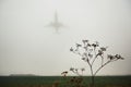 Airplane in thick fog Royalty Free Stock Photo