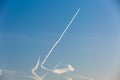 Airplane traces in blue sky Royalty Free Stock Photo