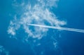 Airplane trail in the blue sky Royalty Free Stock Photo