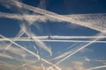 Airplane trails of condesed air in the sky Royalty Free Stock Photo