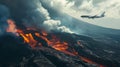 Airplane for transportation flying over crater and reddish illuminated smoke cloud