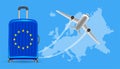 Airplane travel europe with luggage on world map Royalty Free Stock Photo