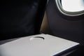 Airplane tray table on seat back