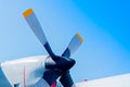 Airplane turboprop engine with propeller on blue sky background Royalty Free Stock Photo