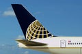 Continental (United) Airlines plane. Sky. Royalty Free Stock Photo