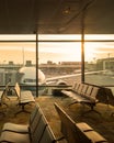 Airplane view from airport lounge in airport terminal. Royalty Free Stock Photo