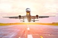 Airplane view from the front cockpit fuselage at sunset at the airport Royalty Free Stock Photo