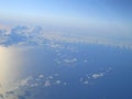 Airplane view of the Sicily Island. Beautiful blue sky with sea view from the plane. View of Italian island Royalty Free Stock Photo