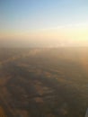 Airplane view of the Sicily Island. Beautiful blue sky with sea view from the plane. View of Italian island Royalty Free Stock Photo