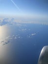 Airplane view of the Sicily Island. Beautiful blue sky with sea view from the plane. View of Italian island Royalty Free Stock Photo