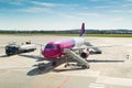 Airplane waiting on the airport Royalty Free Stock Photo