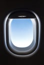 airplane window and Fantastic soft white clouds against blue sky Royalty Free Stock Photo