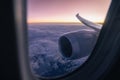 Airplane window over jet engine and wing Royalty Free Stock Photo