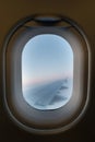 Airplane window overlooking the right wing Royalty Free Stock Photo