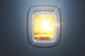 Airplane window with sunset beautiful sky view. Travel and transportation concept. Royalty Free Stock Photo