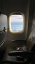 Airplane Window View: Clouds and Sky Royalty Free Stock Photo