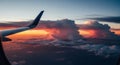 Breathtaking Sunset Sky from Airplane Window with Dramatic Clouds Royalty Free Stock Photo