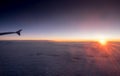 The airplane wing on amazing sunset background Royalty Free Stock Photo