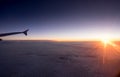 The airplane wing on amazing sunset background Royalty Free Stock Photo