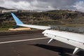 Airplane wing with flaps and spoilers extended to slow down