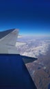 Airplane wing landscape. Airplane wing out of window. Royalty Free Stock Photo