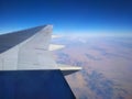 Airplane wing landscape. Airplane wing out of window. Royalty Free Stock Photo