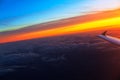 Airplane wing over the clouds Royalty Free Stock Photo