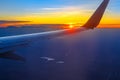 airplane wing at sunset