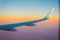 Airplane wing during an incredible sunset Royalty Free Stock Photo