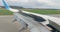 Airplane wing view out of the window on the cloudy sky The Earth Royalty Free Stock Photo