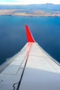 Aircraft wing, city, water Royalty Free Stock Photo