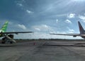 Airplane wings side by side at the airport